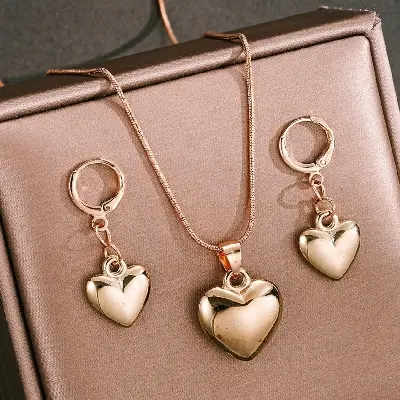 Picture of Fashion Golden Heart Pendant Earrings Necklace Bracelet Jewelry Set