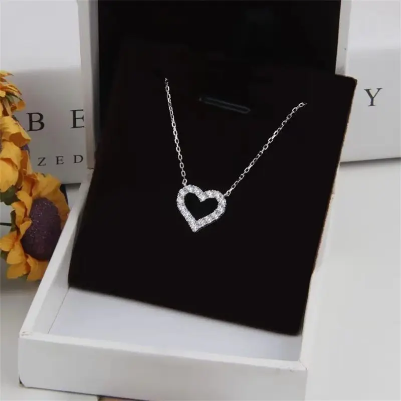 Picture of Love Shape Pendant Necklace for Women and Girls, Gold Plated Titanium Chain, Stylish and Elegant Design