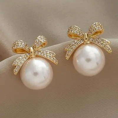 Picture of Luxury Rhinestone Bowknot Pearl Drop Earrings - Gold Plated