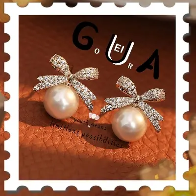 Picture of Luxury Rhinestone Bowknot Pearl Drop Earrings - Gold Plated
