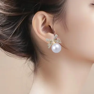 Picture of Luxury Rhinestone Bowknot Pearl Drop Earrings - Gold Plated