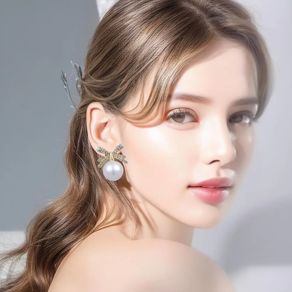 Picture of Luxury Rhinestone Bowknot Pearl Drop Earrings - Gold Plated