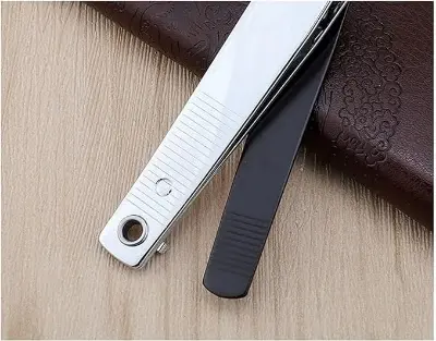 Picture of nail clippers 1 Piece Creative Black BTRAP slanted Stainless Steel Nail Clippers