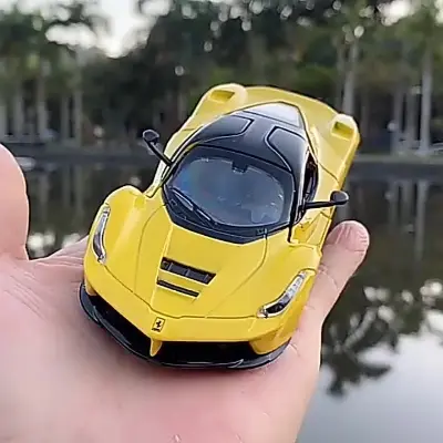 Picture of 1:32 Ferrari supercar, alloy die-casting car model, sound and light, door opening pull-back car toy, collection of birthday gifts