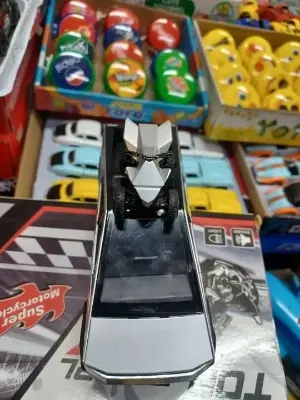 Picture of 1:28 Tesla Cybertruck Diecast Metal Alloy Model car Sound Light Pull Back Collection Kids Toy Gifts