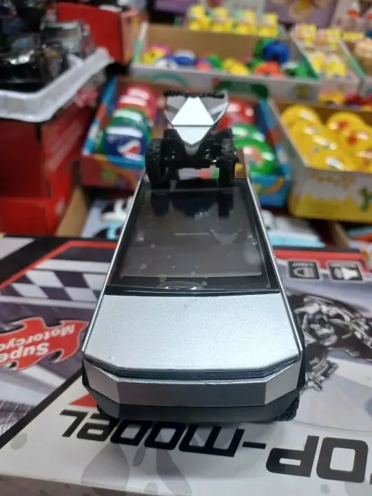 Picture of 1:28 Tesla Cybertruck Diecast Metal Alloy Model car Sound Light Pull Back Collection Kids Toy Gifts