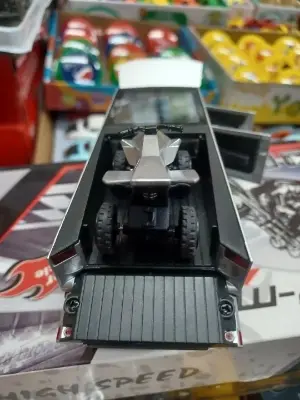 Picture of 1:28 Tesla Cybertruck Diecast Metal Alloy Model car Sound Light Pull Back Collection Kids Toy Gifts