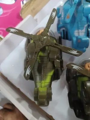 Picture of Mini Helicopter with Movable Pilot and Rotating Fan, Bump and Go Helicopter Toy (Pack of 1) (Random Color) | Baby Birthday Gift(Green)