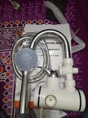 Picture of Electric instant hot water tap with hand shower