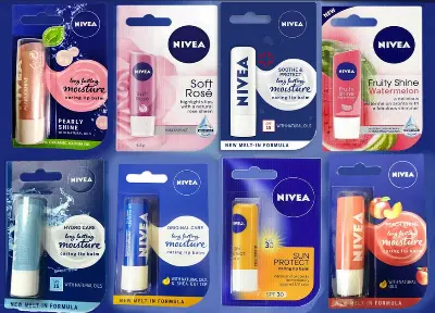 Picture of NIVEA Shine Lip Balm (4.8g), with Shea Butter Natural Oils and Vitamins 1pcs