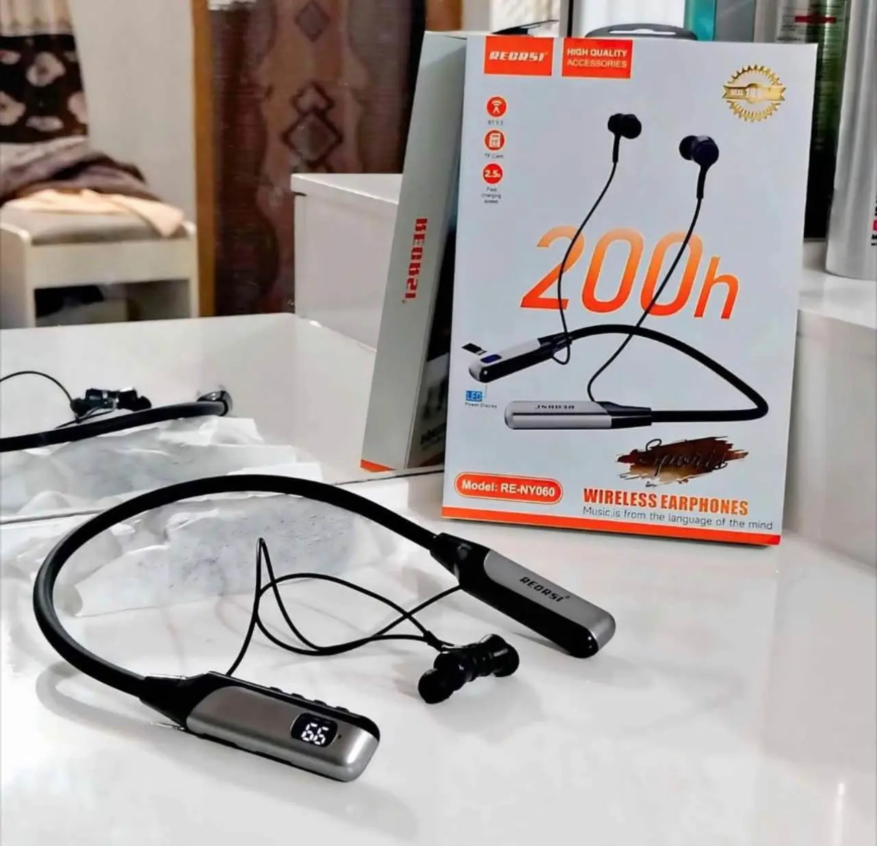 Picture of Recrsi Wireless Neckband Bluetooth Earphone RE-NY060 চার্জ ব্যাক আপ ২০০ ঘন্টা।