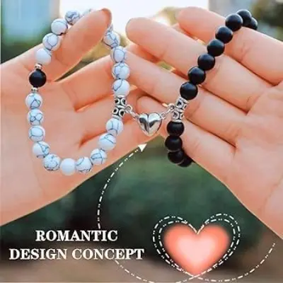 Picture of Magnetic Heart Bracelets for Couples (2 Piece) | Small Rubber Band Magnet Stone Bell Bracelet with Knotted Head Rope (GAME SKU)
