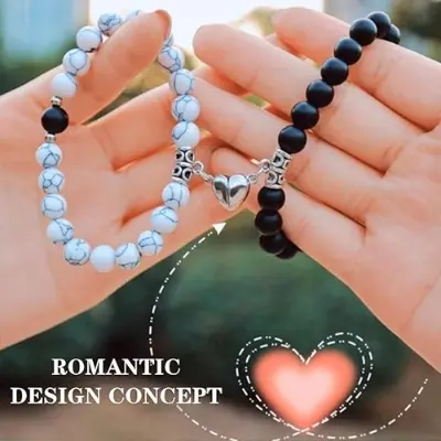 Picture of Magnetic Heart Bracelets for Couples (2 Piece) | Small Rubber Band Magnet Stone Bell Bracelet with Knotted Head Rope