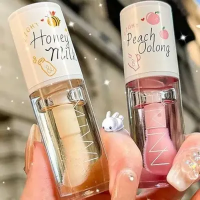 Picture of TWG Moisturizing Lip Essence Oil White Peach Oolong Honey Milk Clear Lip Oil-5ml