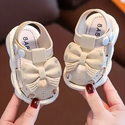 Picture of Sweet Princess Sandals 2022 New Release Stylish Kids Fashion Covered Toes Soft Girl Pink Flower Children Snap Button Flat Casual Non-Slip