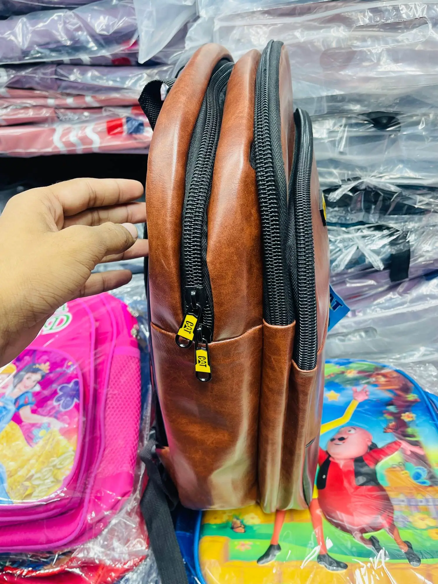 Picture of Viral CAT Design Faux Leather Laptop Backpack for Men & Women | Stylish Tan & Black Checkered College, Office & Travel Bag | Durable PU Leather, Multi-pocket Organizer