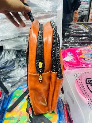 Picture of 🔥 Trendy CAT Backpack for Men - Stylish Checkered Design Laptop Bag | Durable PU Leather Office/College/University Bag | Chocolate Brown Color Backpack