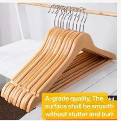 Picture of Wooden cloth hanger  3 pcs sat 44 cm long 23 cm high 1.2 thickness super quality wooden cloth shirt hanger - Brown