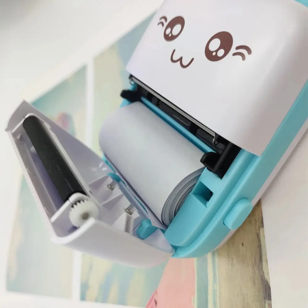 Picture of Portable Mini Printer | Compatible with iOS & Android | Wireless Bluetooth Thermal Printing | Great for Printing Text Messages, Labels, Photos, DIY Projects, Notes, and Creating Posters | Mini Pocket Printer | Ideal for Students, Teachers, and Creatives(Blue)