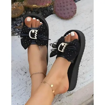 Picture of Women's Stylish Summer Slide Sandals - Black Open-Toe Flats with Golden Metal Buckle & Ruffled Decor, Soft Sole EVA Insole, Perfect for Casual Outfits, Versatile Sandals | Bow Embellished Footwear | Metal Buckle Detail, Strappy Sandals