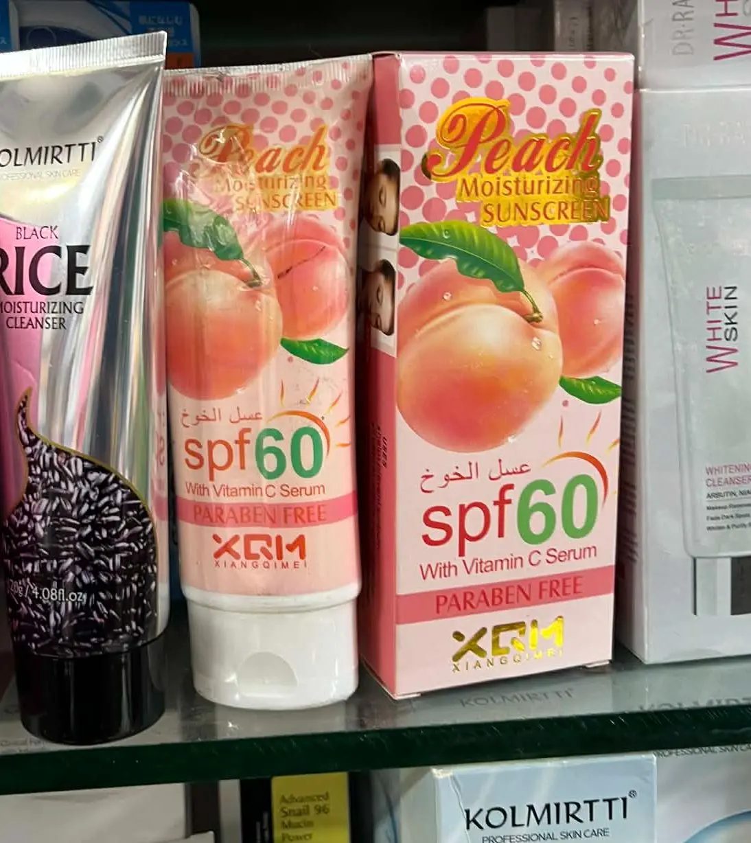 Picture of XQM Moisturizing Sunscreen Peach with vitamin c serum 60+