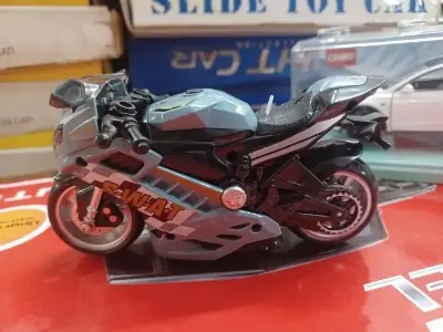 Picture of Motorcycle Model Lighting Sound Effects Children Motorbike Toy Hobbies Model Swat Motorcycle Rescue Bike Friction Powered
[9/16, 8:18 PM] Rafie Islam: Black 1:36 Toyota Revo Hilux Vego Dala High Simulation Metal Diecast Model - Multicolor