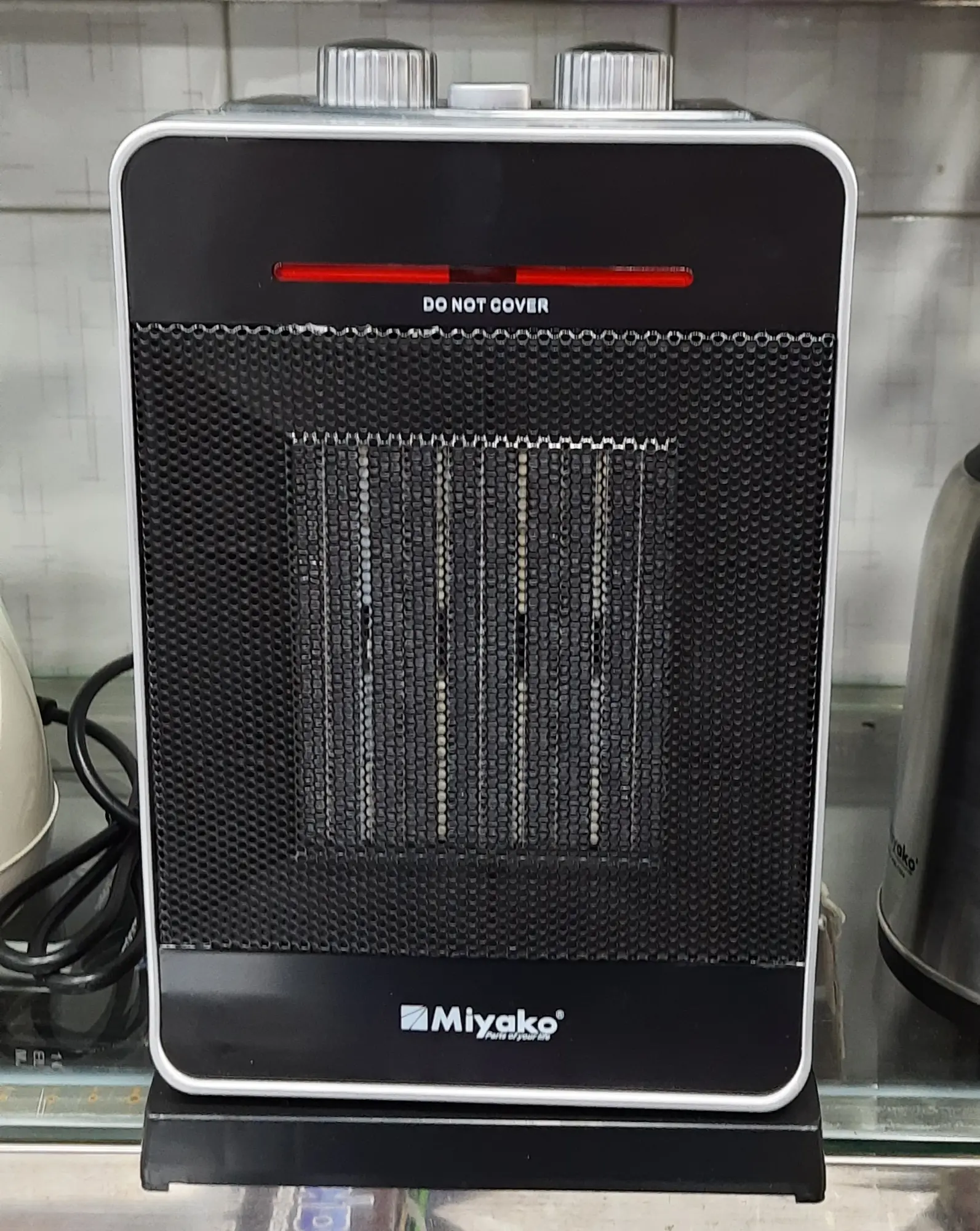 Picture of Miyako PTC-602 Electric Room Heater With Moving 2000 watt | Color Family : Black - Black