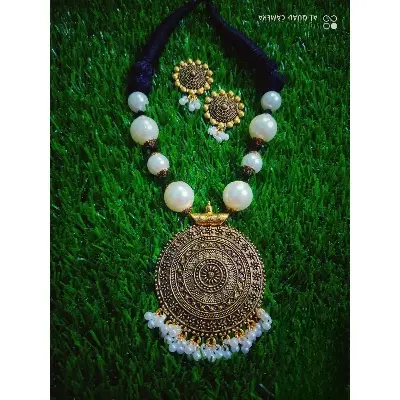 Picture of Exclusive Designer Black And Golden  Necklace  And  Earrings For Woman