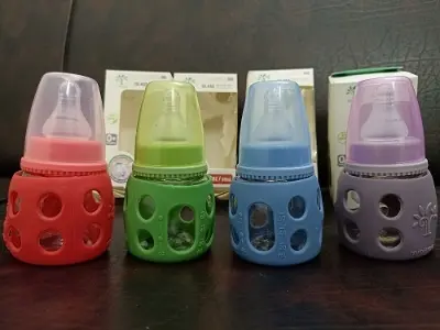 Picture of 60 ml Glass Feeder with Silicone Cover For (0-3 months) Baby Multicolor