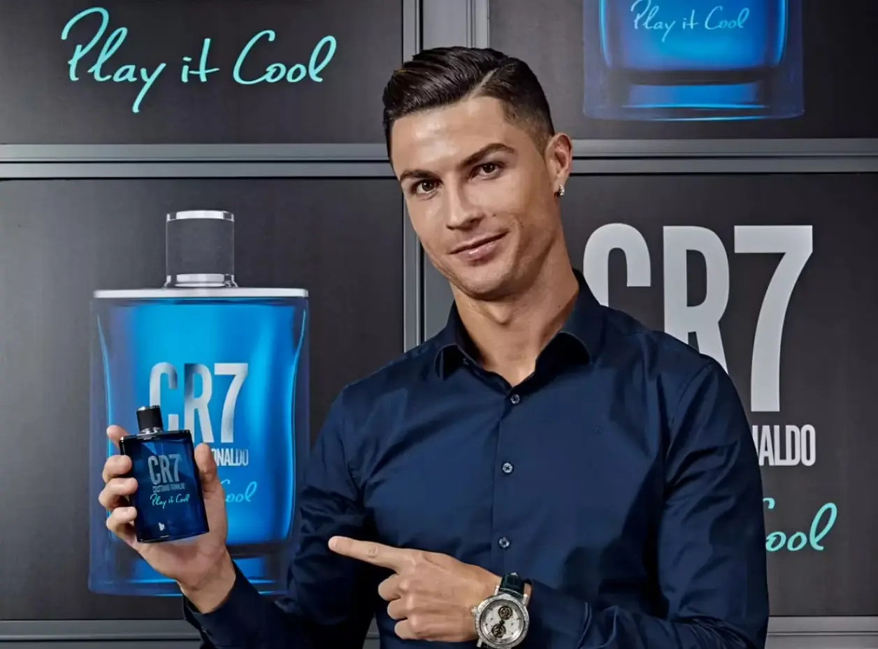 Picture of Champion's Edge Ronaldo's  - The "CR7"  Fragmatica x Honestime: Tribute Embrace the confident mix of crisp apple, fresh sage, and warm sandalwood. Highlighted by vetiver and vanilla. A bold, iconic scent for the man destined for success, Daraz exclusive! (10mg)