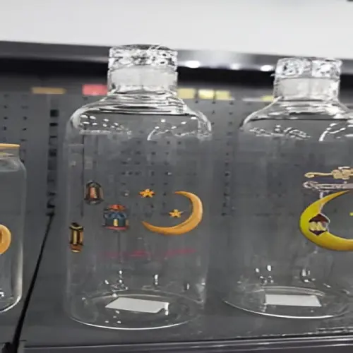 Picture of Glass water bottle with a Ramadan-themed design 1 Litre