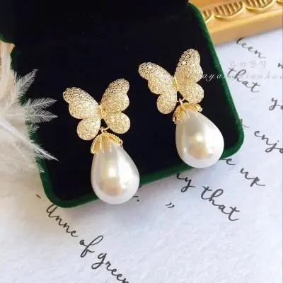 Picture of Korean version of fashion hot selling earrings simple temperament crystal butterfly pearl ear nail Earrings women