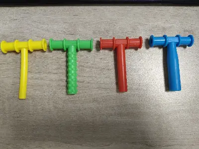 Picture of ORGINAL T Shape Silicone Chewable Oral Motor Chewy Tube Sensory for- Autism Sensory toy  ,ADHD Therapy,  New Born Oral Placement Therapy,Speech Therapy,Gum Muscle Tongue Trainer for Autistic Children Speech Rehabilitation Line Harmonica Vocalization