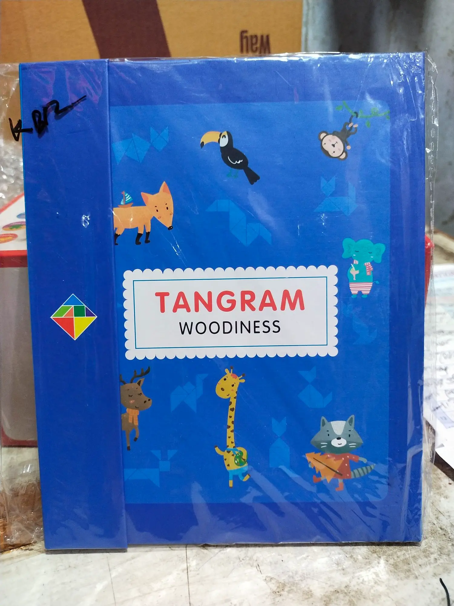 Picture of Magnetic Wooden Tangram Puzzle Book - Educational Brain Teaser Toy for Kids & Adults - Travel Friendly Logic Game