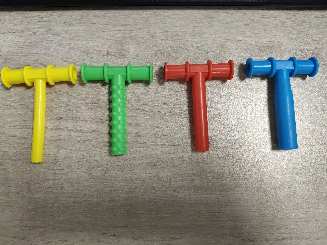Picture of ORGINAL T Shape Silicone Chewable Oral Motor Chewy Tube Sensory for- Autism Sensory toy  ,ADHD Therapy,  New Born Oral Placement Therapy,Speech Therapy,Gum Muscle Tongue Trainer for Autistic Children Speech Rehabilitation Line Harmonica Vocalization
