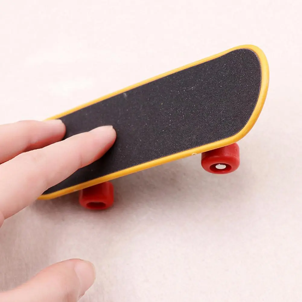 Picture of Creative Printing  plastic Finger Skate board Toy 1pc