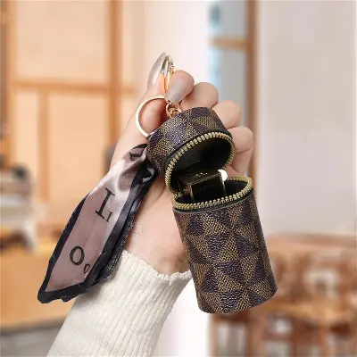 Picture of Mini Keychain Bag Can Store Earphones Lipsticks Hanging Hooks Made Of PVC Material A Gift For Girls