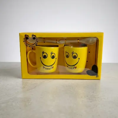 Picture of Cute Yellow Smiley Emoji Ceramic Mug Set with Spoons (Pack of 2) – Premium Gift Box