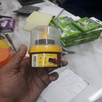 Picture of Liquid Shoe Polish Bottle with a Sponge Applicator