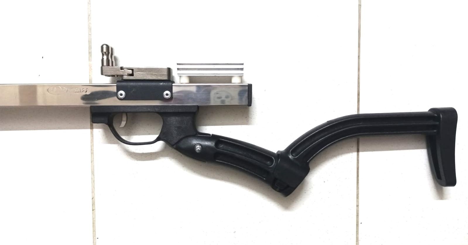 Picture of New most powerful slingshots rifle in the country Stainless Steel Special Pole + Resin Rifle Grip + Zinc Alloy Spreader + 10 Strand SS Bow Head + 6 strand powerful Rubber + Red Small Laser + Aluminum Mount very powerful (Ready) (Stainless Steel)