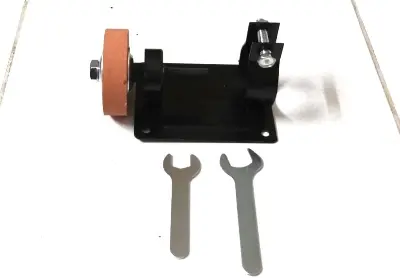 Picture of Convert your Hand Drill into Grinding, Cutting, Polishing, Sharpening machine, usable for grinding wheel and polishing stone, etc. (Stone included) (Random Color)