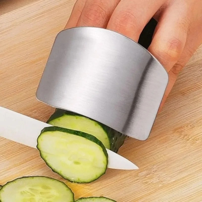 Picture of Stainless Steel vegetable cutter hand guard household finger Guard -kitchen finger Guard tool-The Asia Express - Silver