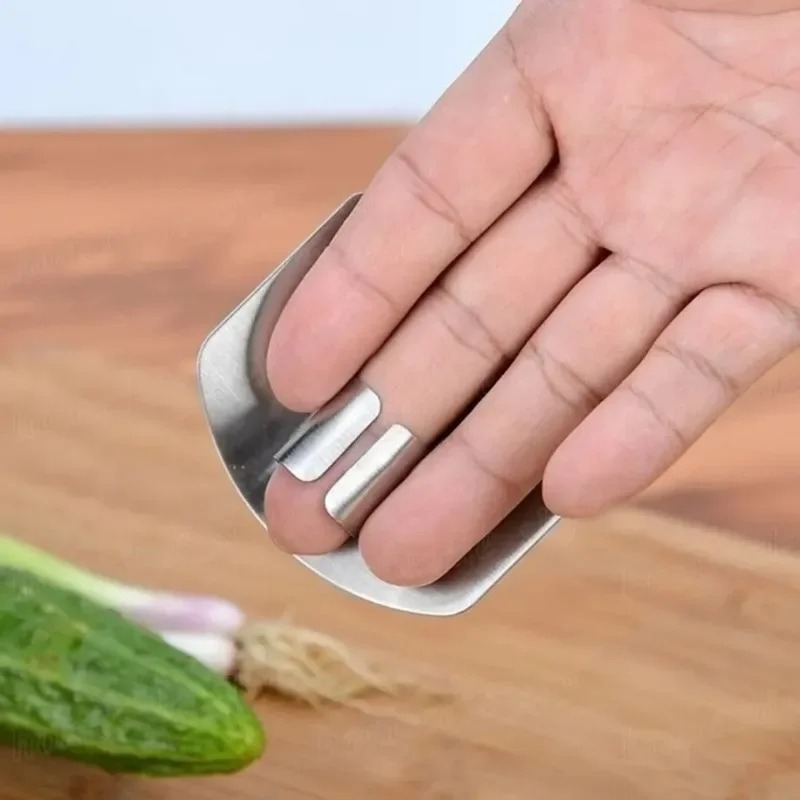 Picture of Stainless Steel vegetable cutter hand guard household finger Guard -kitchen finger Guard tool-The Asia Express - Silver