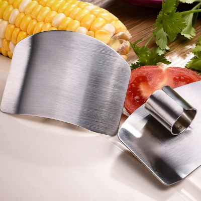 Picture of Stainless Steel vegetable cutter hand guard household finger Guard -kitchen finger Guard tool-The Asia Express - Silver