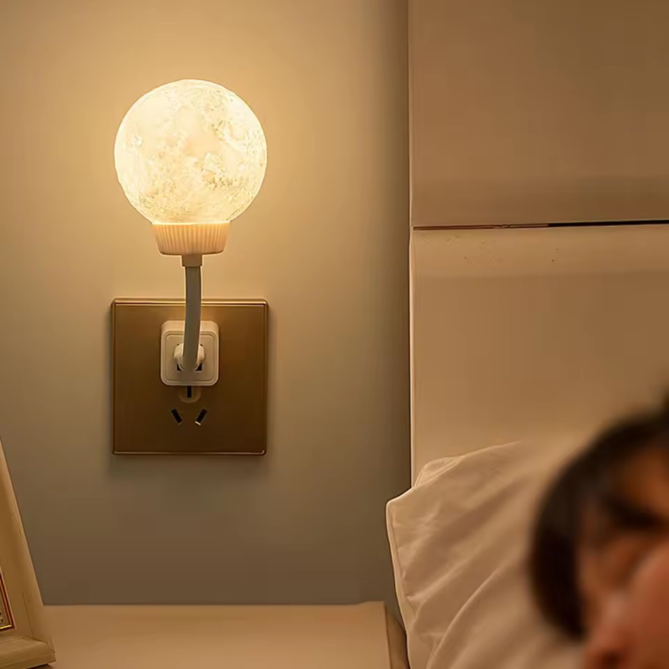 Picture of New Design USB Energy-Saving Voice-Controlled Night Light, Moon-Shaped Plug-In Lamp, 3 Lighting Modes,  Rotating Ambient Light for Home & Bedroom- The Asia Express - White