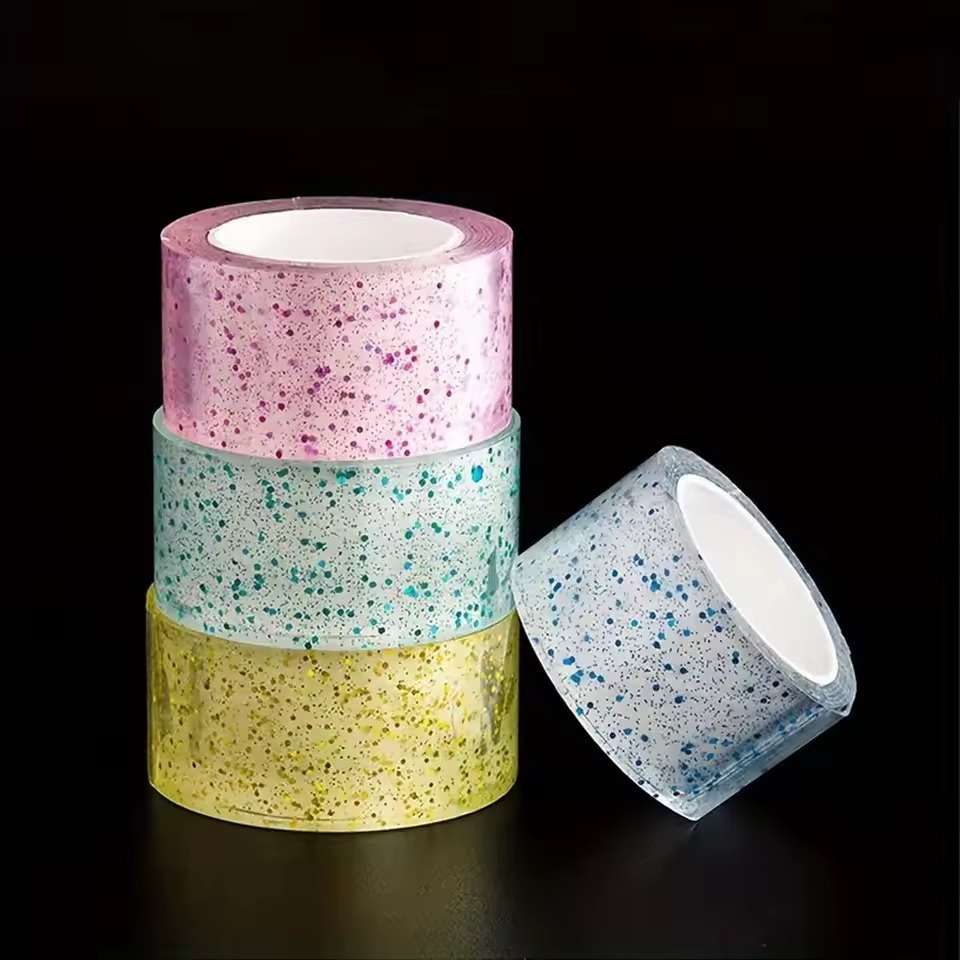 Picture of 1PC Colorful Glitter Nano Bubble Tape – High-Sticky Double-Sided Adhesive Blowable Bubble Tape for DIY Craft, Pinch Bubble, Stress Relief & Creative Toy Making - The Asia Express - Multicolor