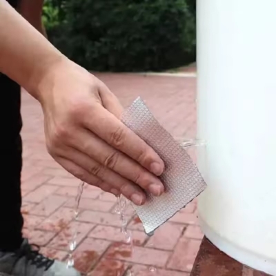 Picture of Super Sticky Aluminum Foil Buty Rubber Tape Self-Adhesive Waterproof Sealing Tape, Roof, Pipe, Wall & Marine Leak Repair Tape High-Strength Heat & Water Resistant Sealant Tape- The Asia Express - Silver