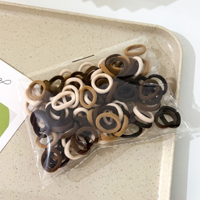 Picture of 100PCS Baby Girl Hair Bands Elastic - Colorful Mini 2 cm Rubber Bands for Kid's Ponytails/Hair Accessories/Hair Band opp bag(Multicolor) (coffee 100pcs,CM: 2cm)