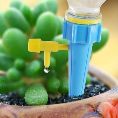 Picture of Automatic flower watering device for business trips, household water seepage device, timed adjustable flow rate, drip irrigation, lazy watering device (Green 2 pcs)