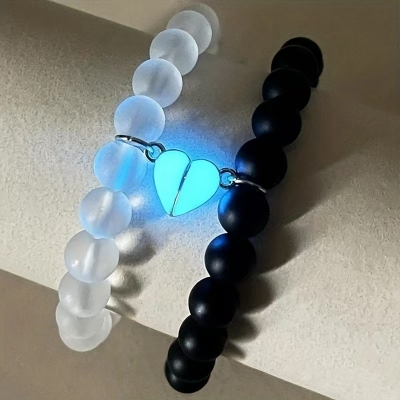 Picture of Shop Pro Magnetic Heart Bracelets for Couples (2 Piece) | Small Rubber Band Magnet Stone Bell Bracelet with Knotted Head Rope